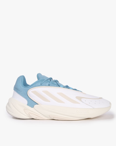 Adidas blue and outlet white shoes