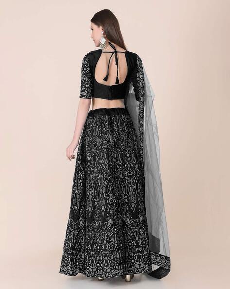 Photo of black full sleeves crop top high neck with lehenga skirt