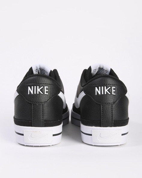 Nike Court Legacy sneakers in white and black