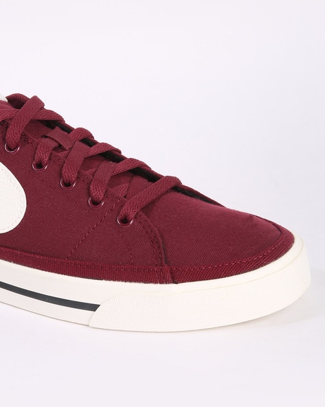 Nike red hot sale canvas shoes