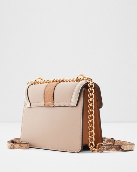 Beige color store sling bags