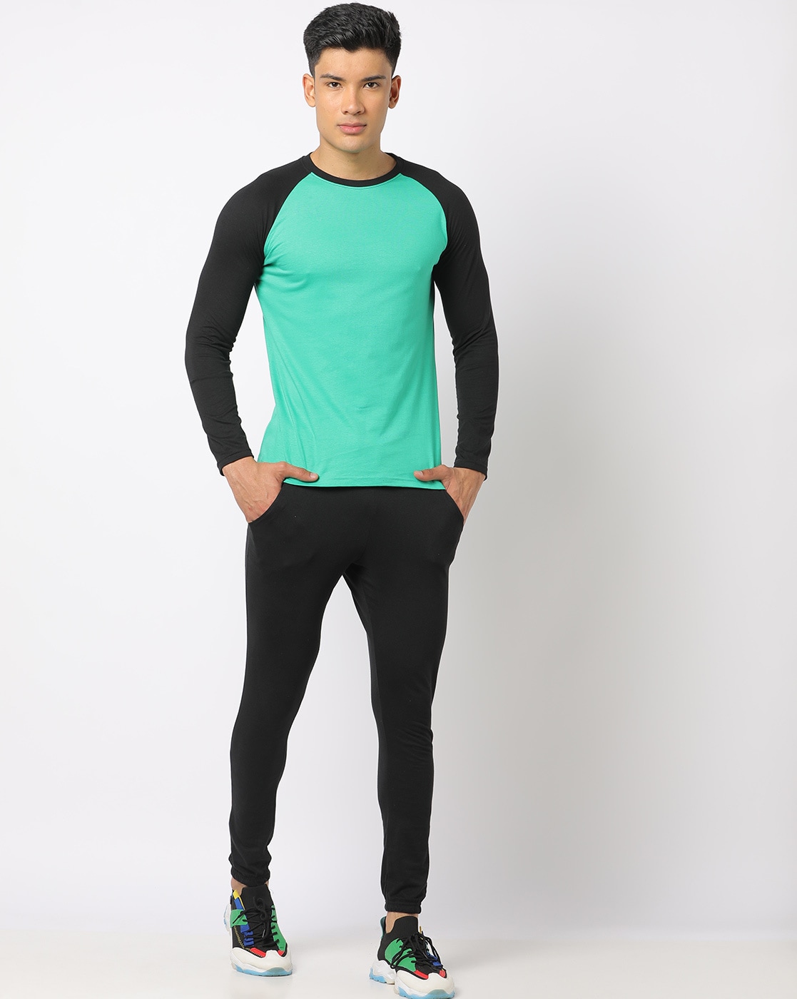 Attractive Young Indian Man Full Height Portrait In Black T Shirt Silver  Neck Chain In Green Park Stock Photo  Download Image Now  iStock