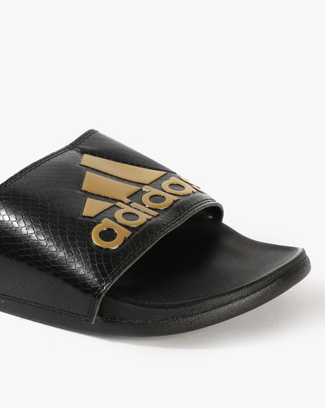 Adidas black discount and gold sliders