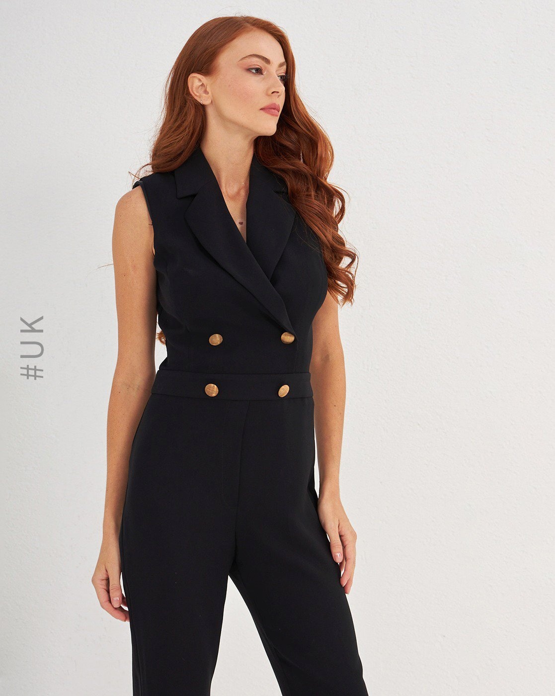 Black jumpsuit store with gold buttons