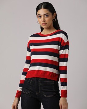 striped sweater and red jeans