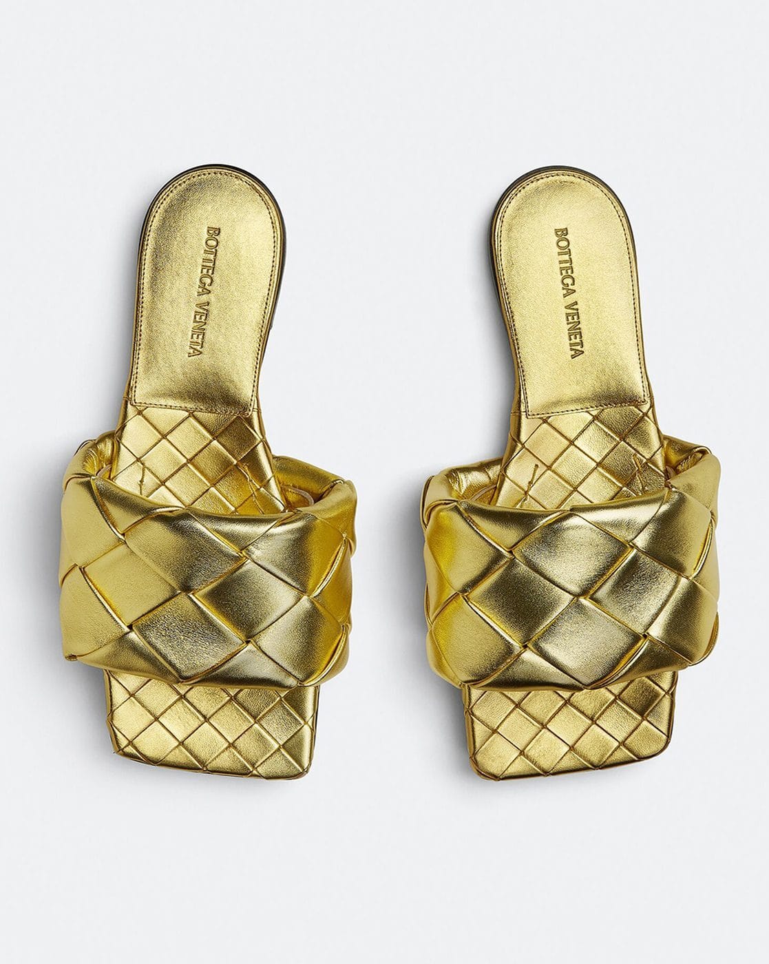Buy BOTTEGA VENETA Lido Metallised Flat Sandals | Gold Color