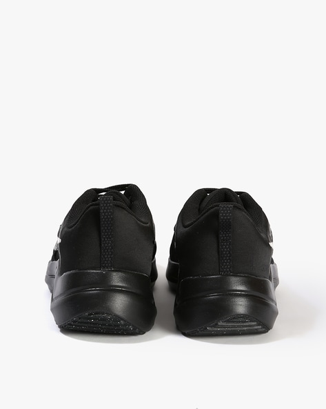 Nike all best sale black shoes