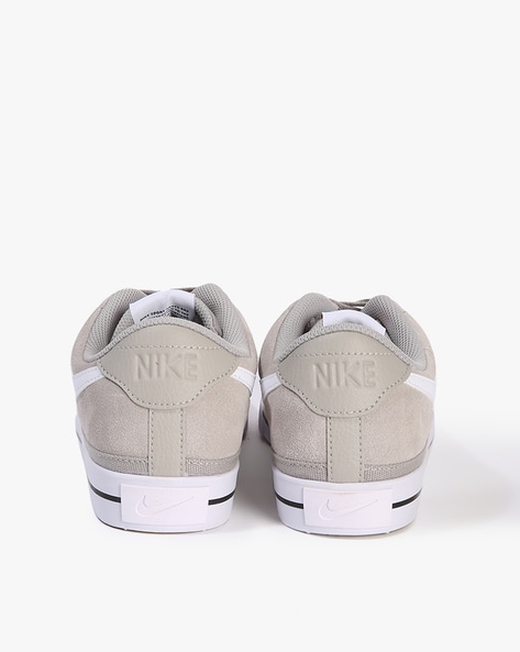 Nike store beige suede