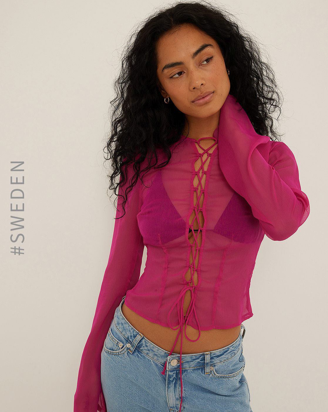 Pink sheer sales top