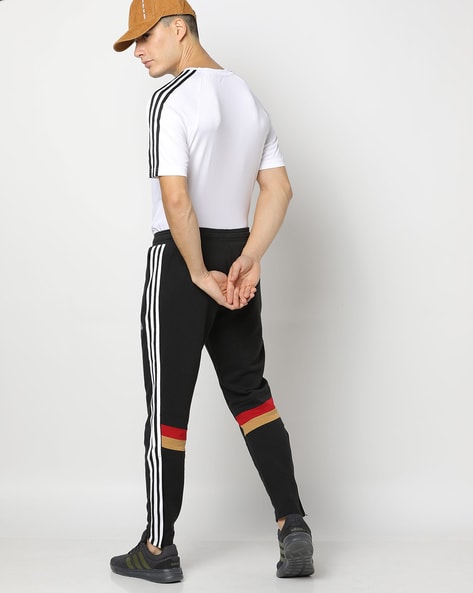 Discover more than 87 adidas side button track pants latest