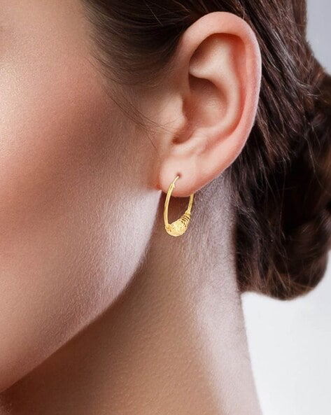 Huggies Are Your New Everyday Earring—Here's How to Style Them