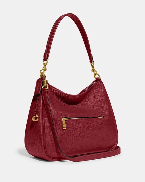 Coach bags store red color