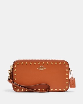 Coach crossbody pouch discount with rainbow rivets