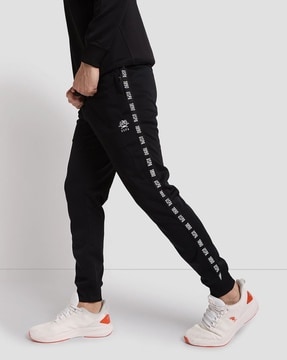 Nike taping skinny fit joggers hot sale in black