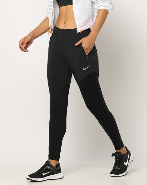 Nike Dri-FIT Swoosh Run Women's Mid-Rise Running Trousers. Nike IN