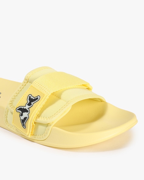 Rihanna puma best sale slides yellow