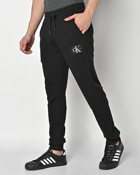 Buy Black Track Pants for Men by Calvin Klein Jeans Online 