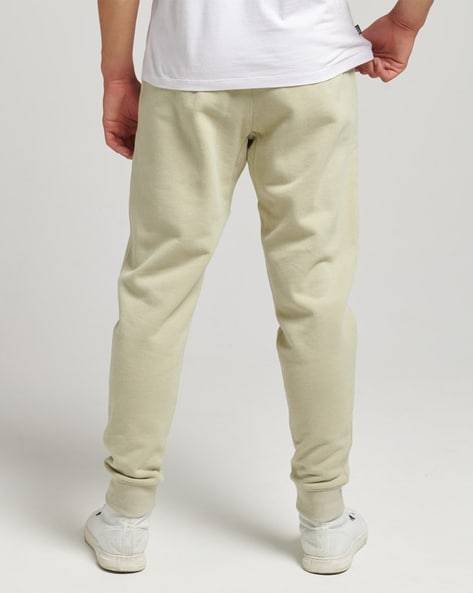 Buy Off White Track Pants for Men by SUPERDRY Online Ajio