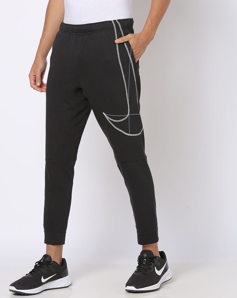 Nike Hybrid cuffed joggers in black | ASOS