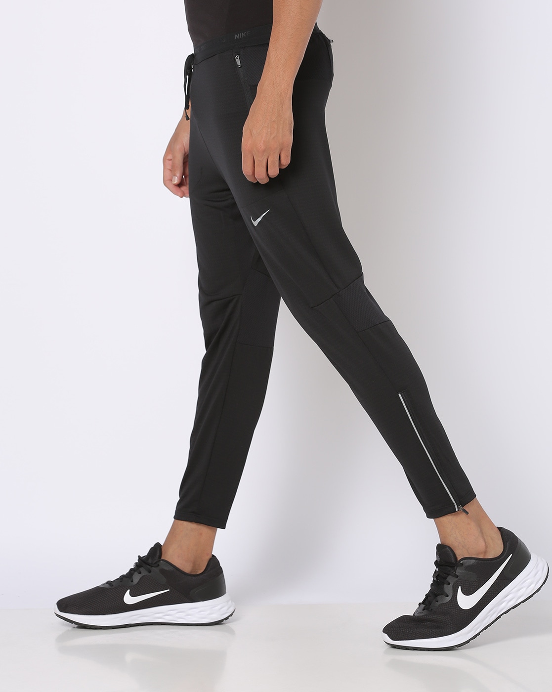 Nike track pants with ankle sales zipper