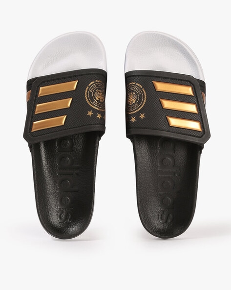 Adidas adilette best sale slides black gold