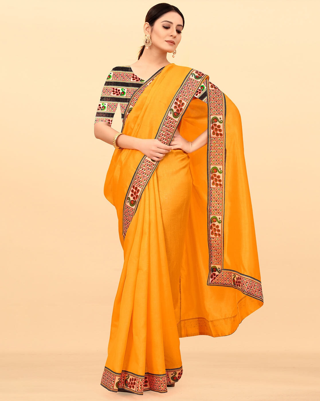 Which color blouse will match a yellow saree? - Quora