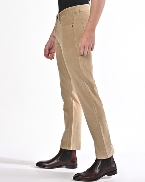 Buy Arrow Sports Men Beige Flat Front Solid Corduroy Trousers - NNNOW.com