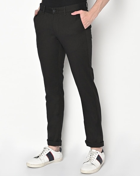 Buy Indian Terrain Men Black Solid Kansas Fit Chino Trousers - Trousers for  Men 1816139 | Myntra