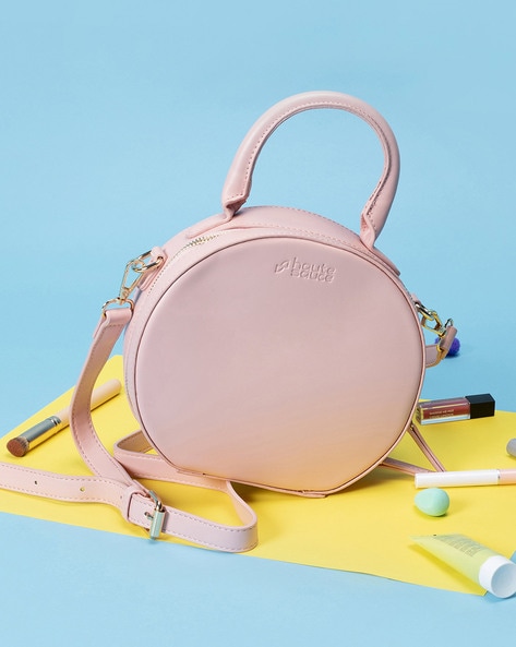 Circle shape sling online bag