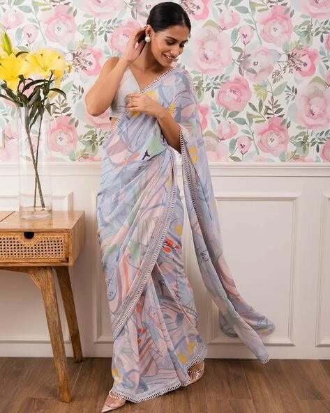 Ice blue ruffle saree by House of Tushaom