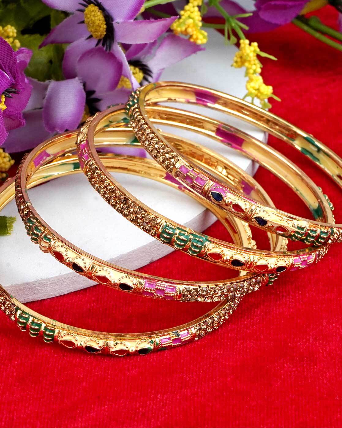 mansiyaorange bangles