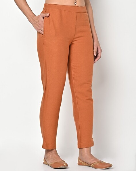 Best orange pants to buy and how to style them like Deepika Padukone Kiara  Advani and more stars  Vogue India