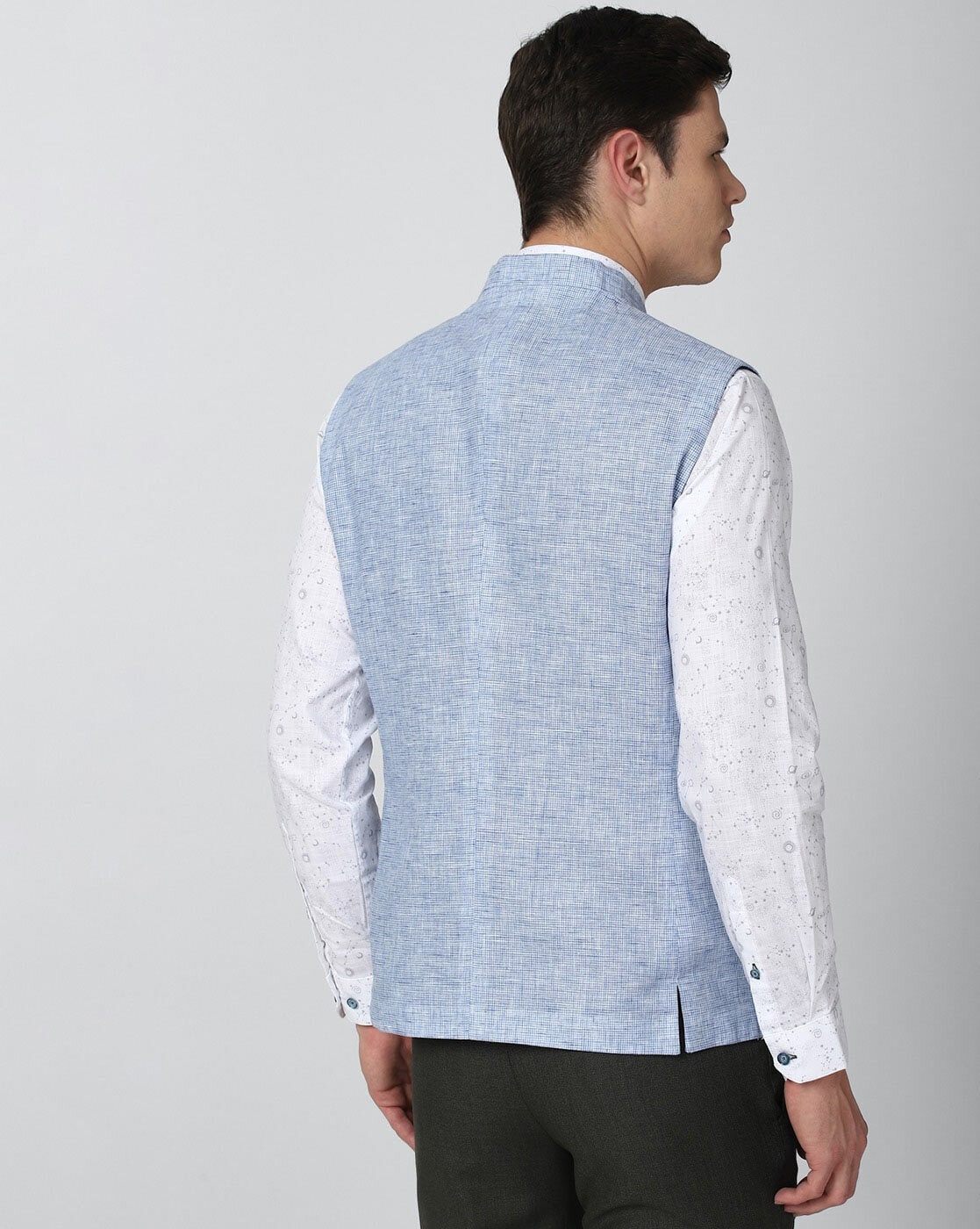 Reversible sleeveless quilted jacket in blue and white pochampally cotton