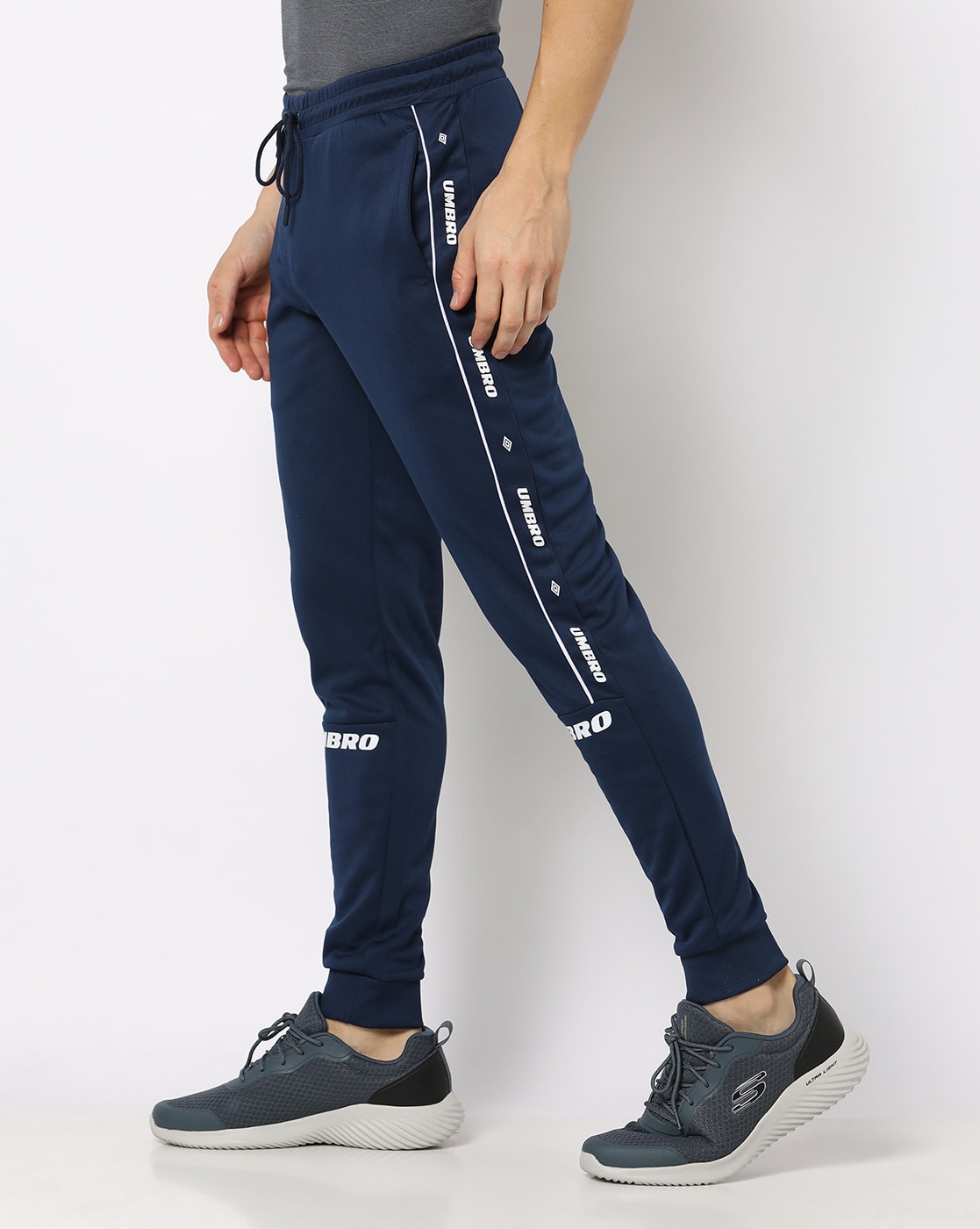 UMBRO by FBB Solid Men Black Track Pants - Buy Black UMBRO by FBB Solid Men  Black Track Pants Online at Best Prices in India | Flipkart.com