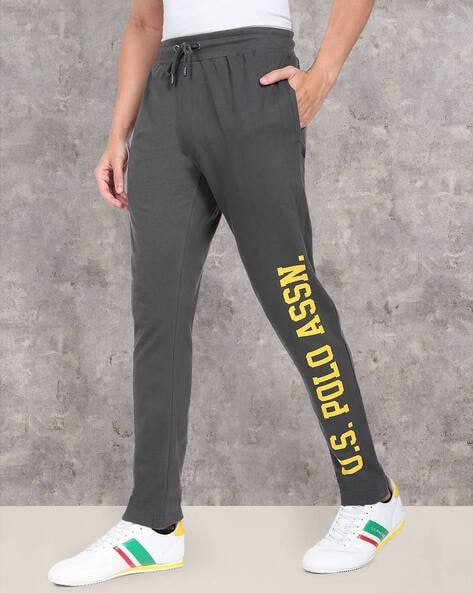 Buy One8 X PUMA Virat Kohli Men Brand Logo Print & Side Taping  Colourblocked Slim Fit Joggers - Track Pants for Men 23088324 | Myntra