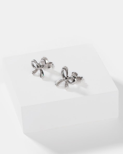 Kingsley Ryan Sterling Silver wire bow stud earrings in silver | ASOS