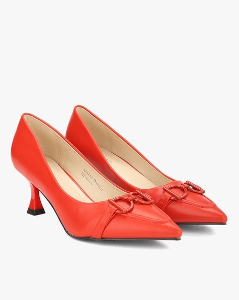 Red pumps with on sale bow