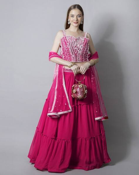 pink potli with lehenga
