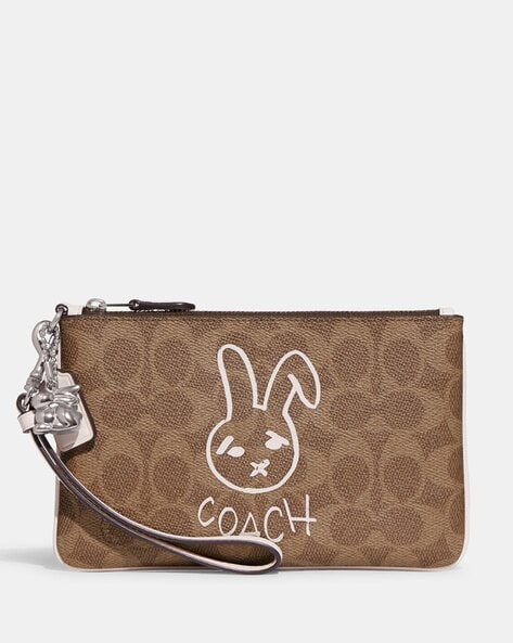 COACH Large Pouch Wristlet In Leather in Brown | Lyst