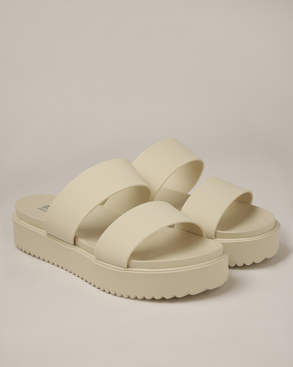 Buy CHUNKY YET CHIC WHITE BLACK FLAT SANDALS for Women Online in India