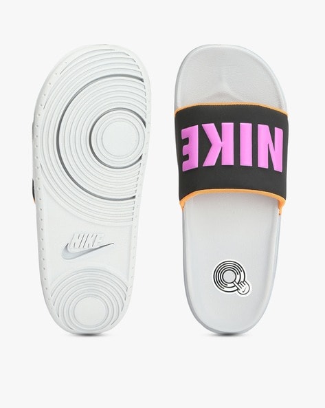 Pink and yellow online nike slides