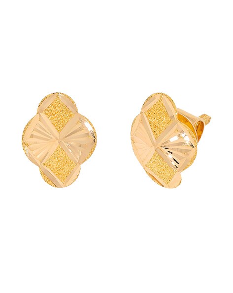 Gold plated uncut polki kundan studs with engraved quartz in peach 