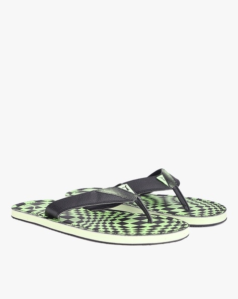 Puma black and outlet green flip flops