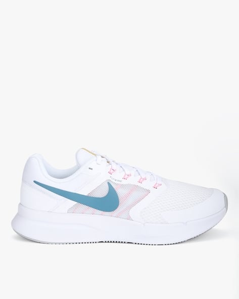 Buy White Sports Shoes for Women by NIKE Online
