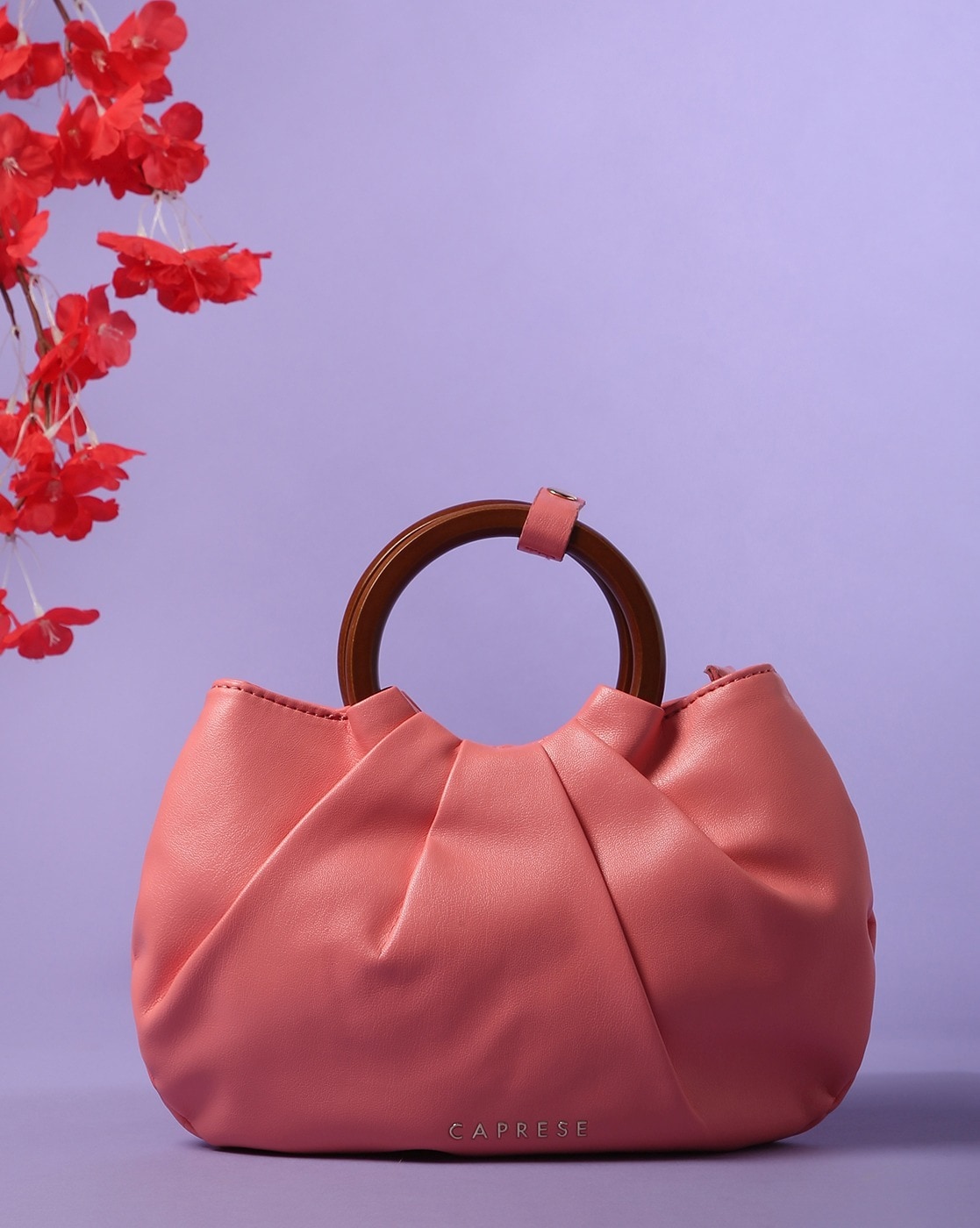 Caprese pink clearance sling bags