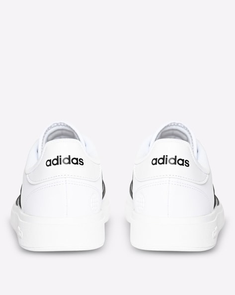 Adidas canvas hotsell tennis shoes