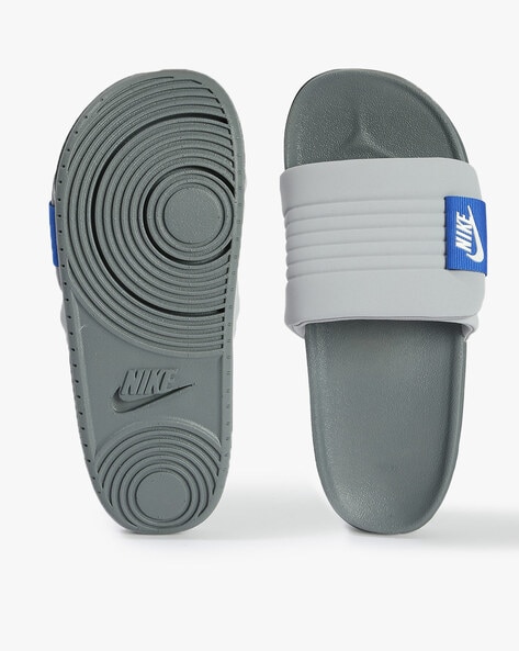 Grey nike hot sale flip flops