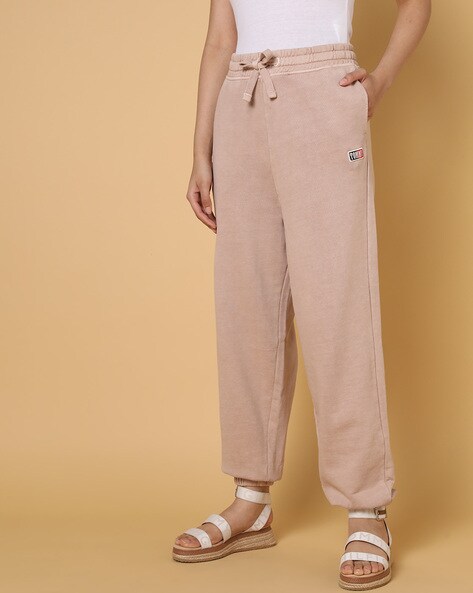 Buy Beige Track Pants for Women by Calvin Klein Jeans Online