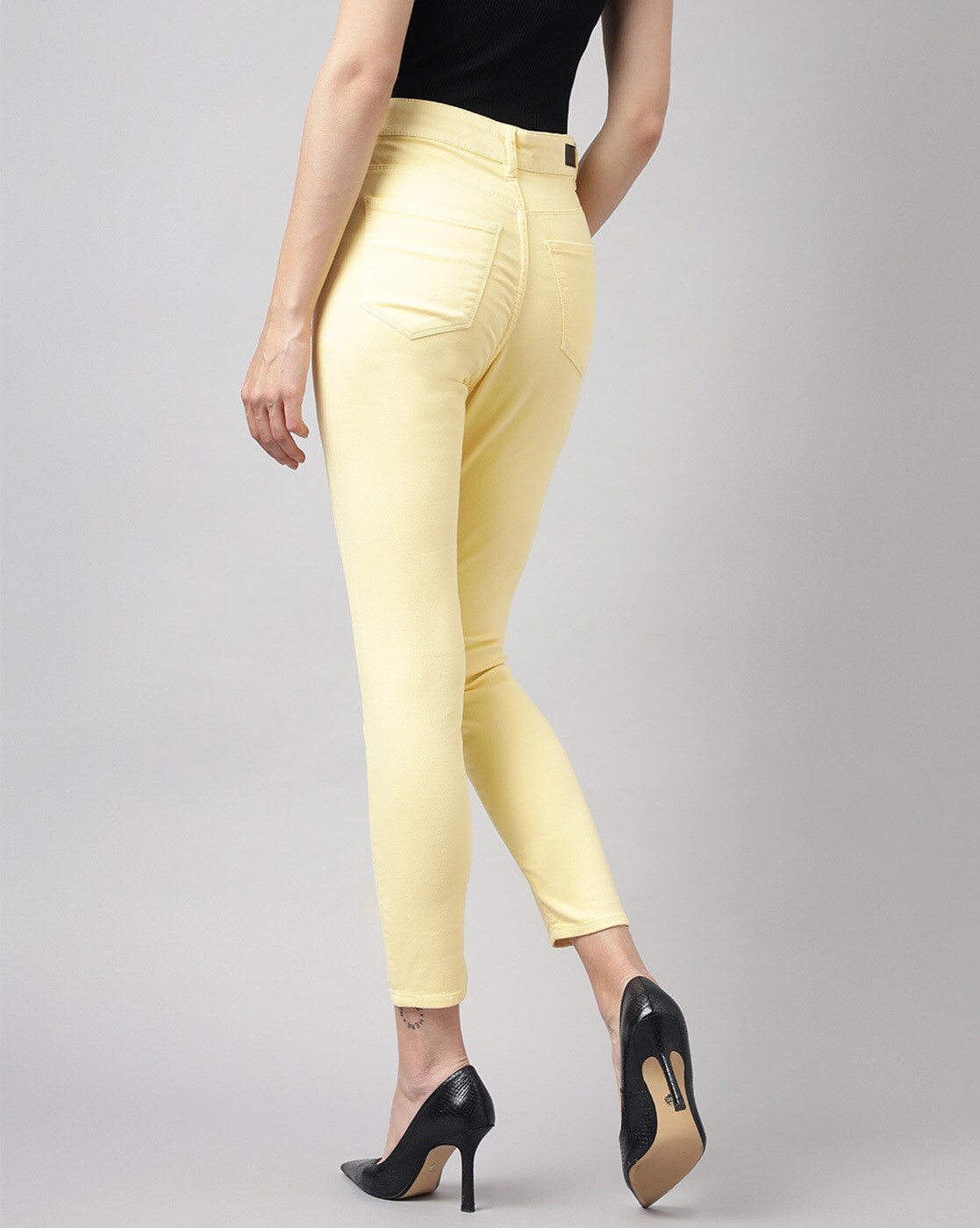 bright yellow skinny jeans