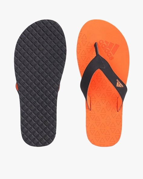 Orange adidas best sale flip flops